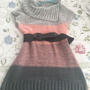 Grey/pink sweater with cowl neck and belt.
